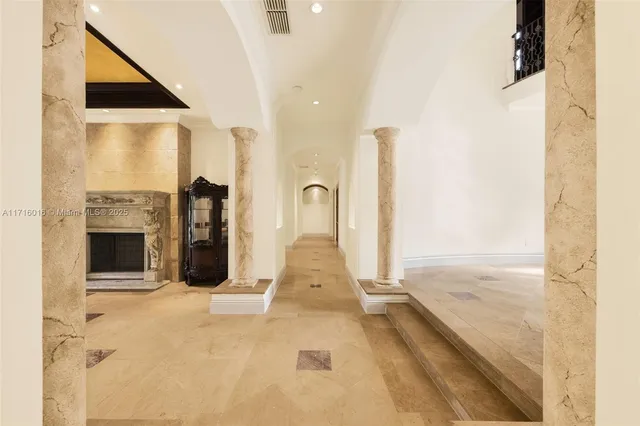 a kitchen with stainless steel appliances granite countertop a stove and more cabinets