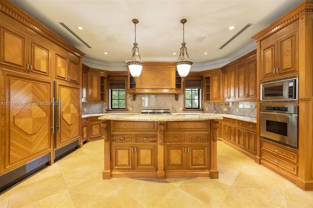 a view of a patio with chairs and potted plants