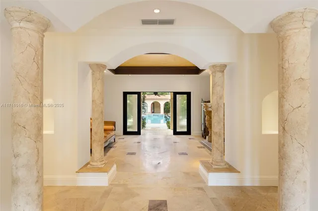 a front view of a house with outdoor seating