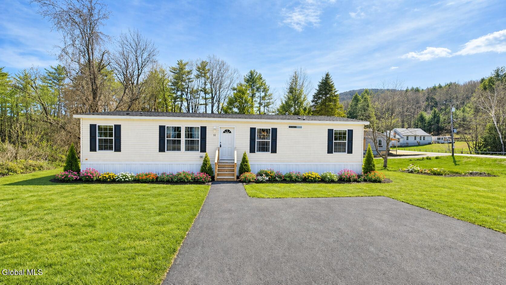51 West Mountain Road Corinth, NY 12822 - Photo 1 of 28 51 w mtn virtual fr yard