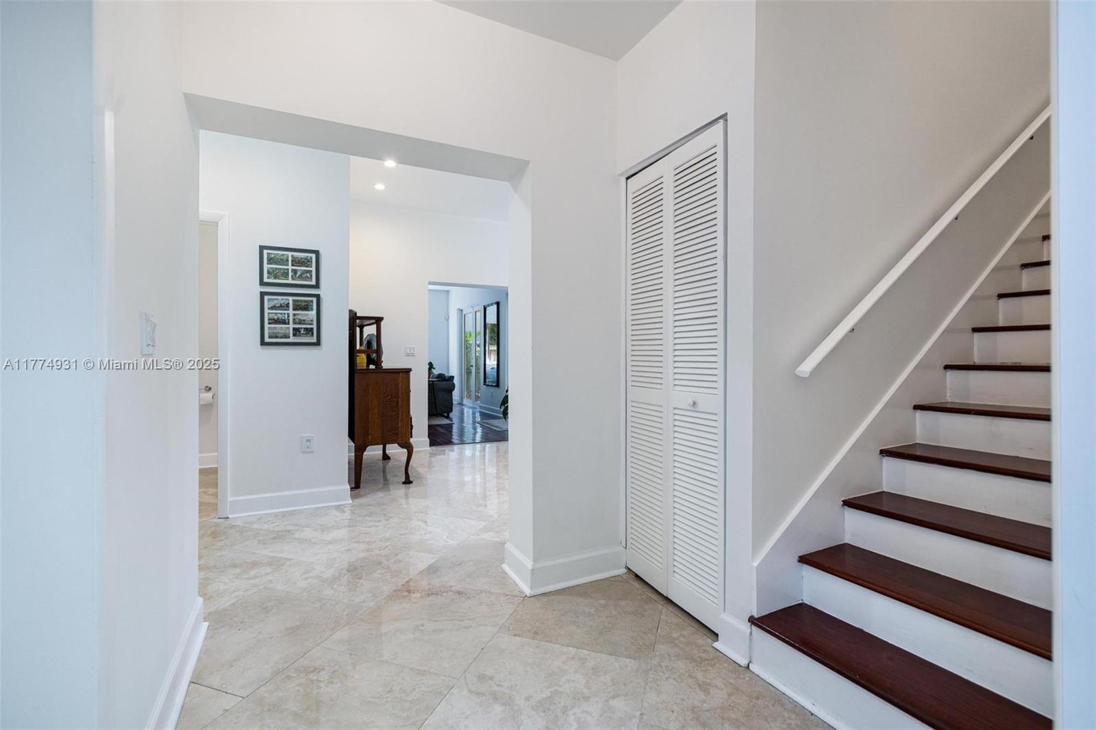 2210 Overbrook Street Miami, FL 33133 - Photo 12 of 26 a view of entryway with stairs and a living room