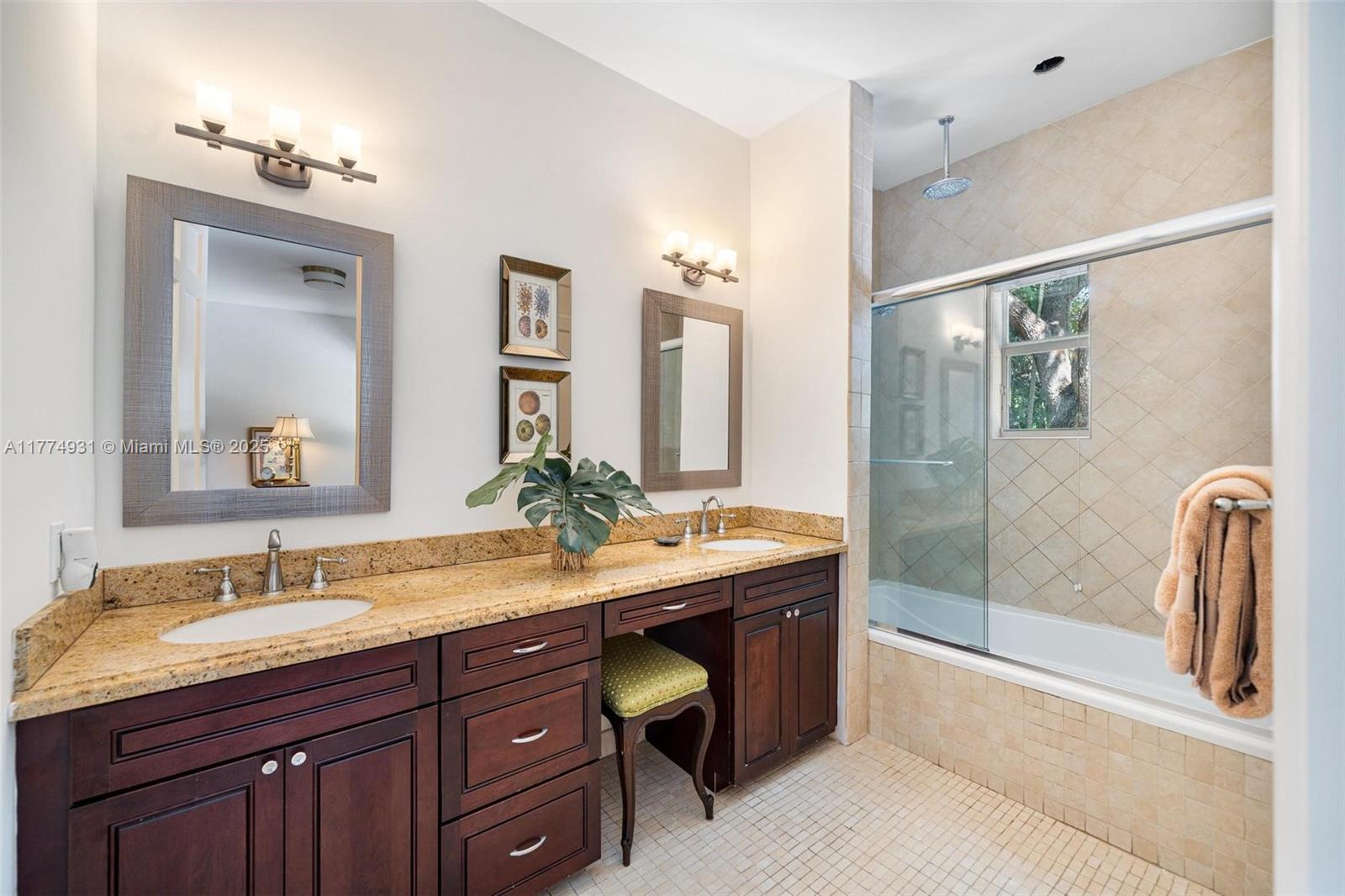 2210 Overbrook Street Miami, FL 33133 - Photo 15 of 26 a bathroom with a granite countertop sink a toilet and a mirror