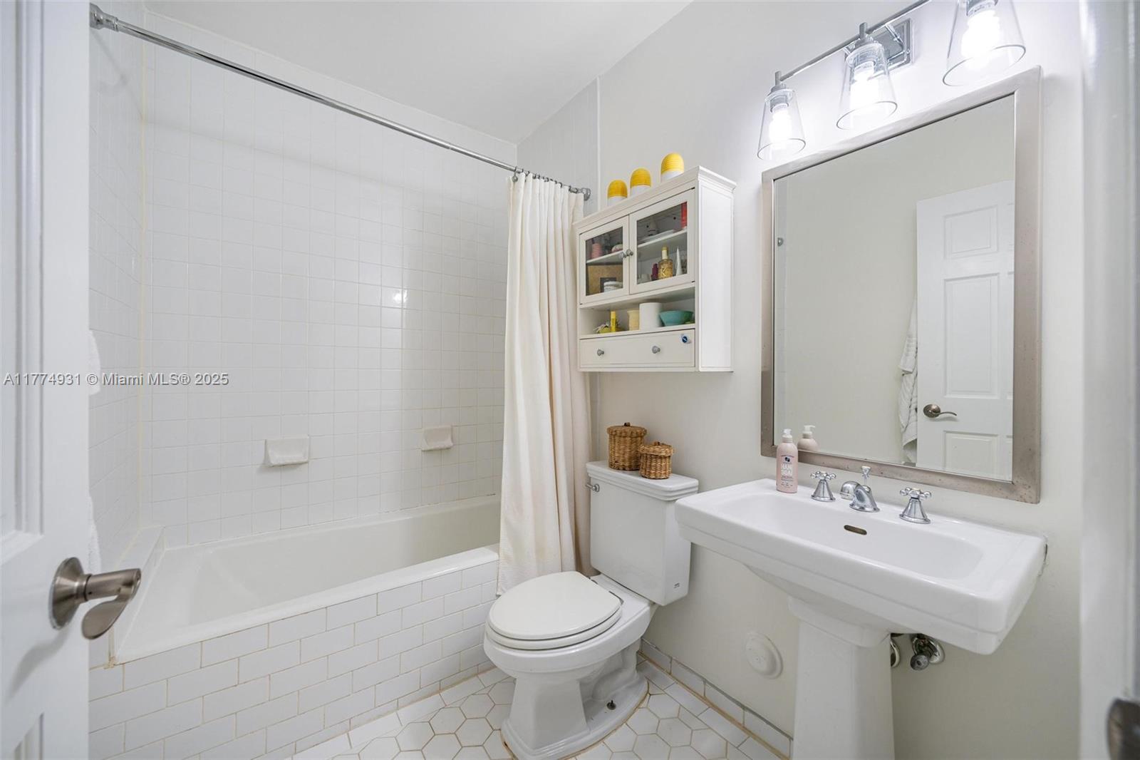 2210 Overbrook Street Miami, FL 33133 - Photo 21 of 26 a bathroom with a sink toilet and shower