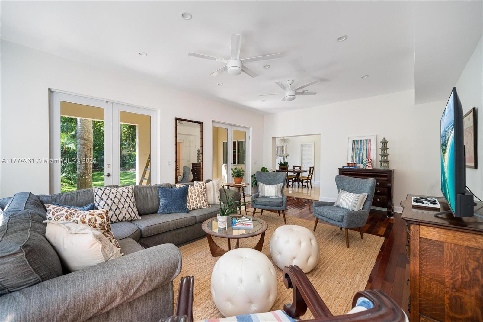 2210 Overbrook Street Miami, FL 33133 - Photo 3 of 26 a living room with furniture and a flat screen tv