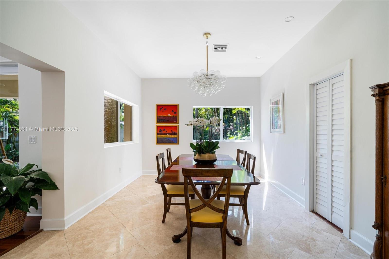 2210 Overbrook Street Miami, FL 33133 - Photo 6 of 26 a dining room with furniture and window