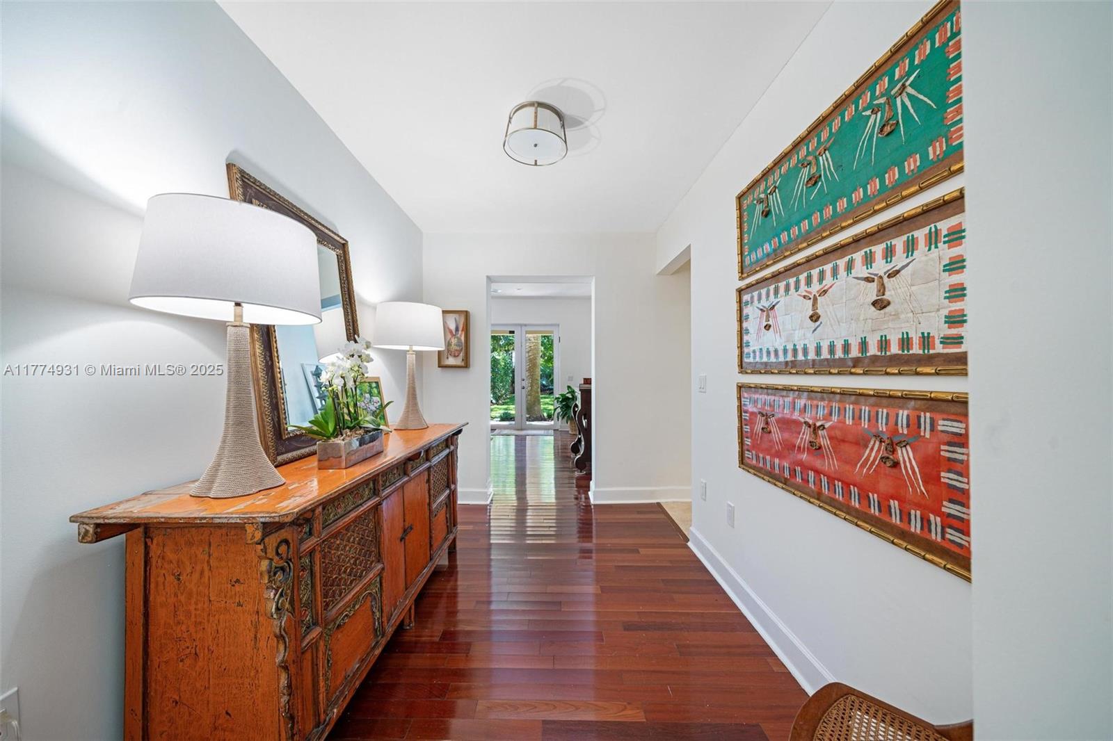 2210 Overbrook Street Miami, FL 33133 - Photo 7 of 26 a view of a hallway with wooden floor