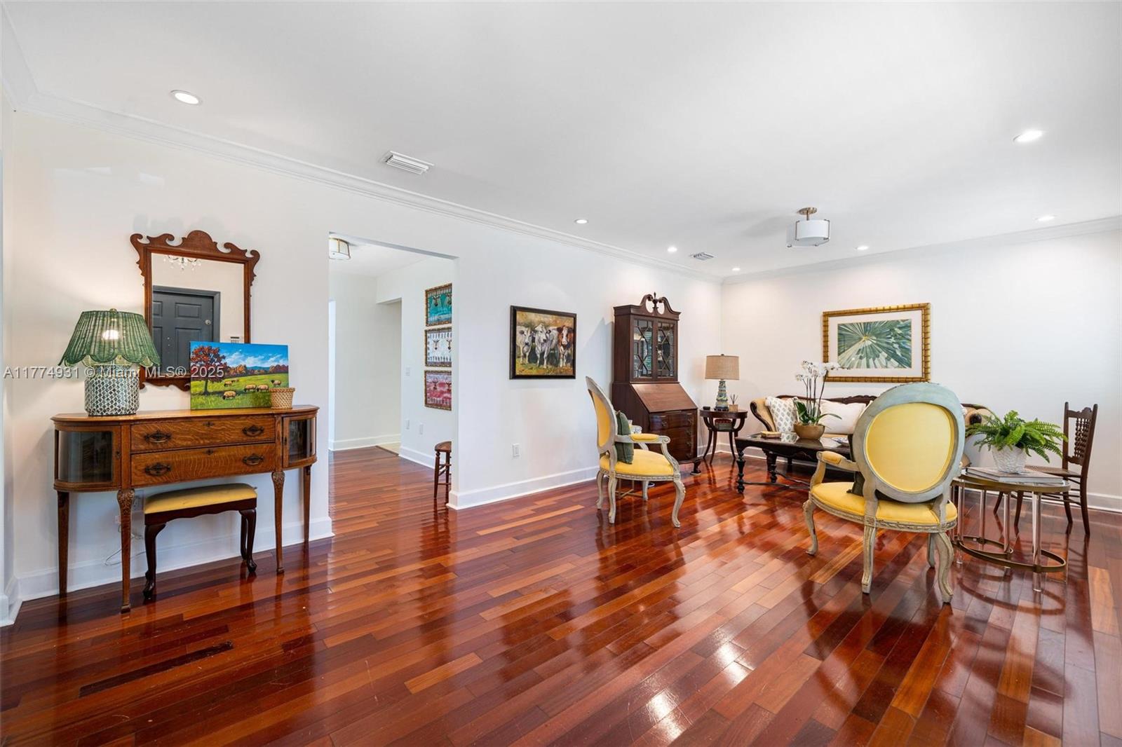 2210 Overbrook Street Miami, FL 33133 - Photo 8 of 26 a living room with furniture a dining table and wooden floor