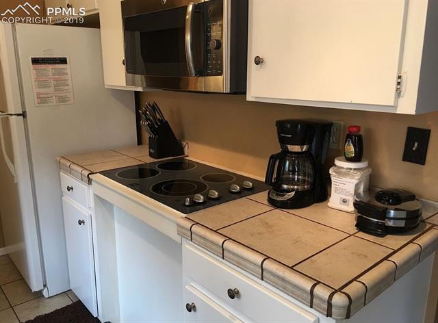 1539 West Cheyenne Road Colorado Springs, CO 80906 - Photo 18 of 29 Unit 1541 kitchen view #2
