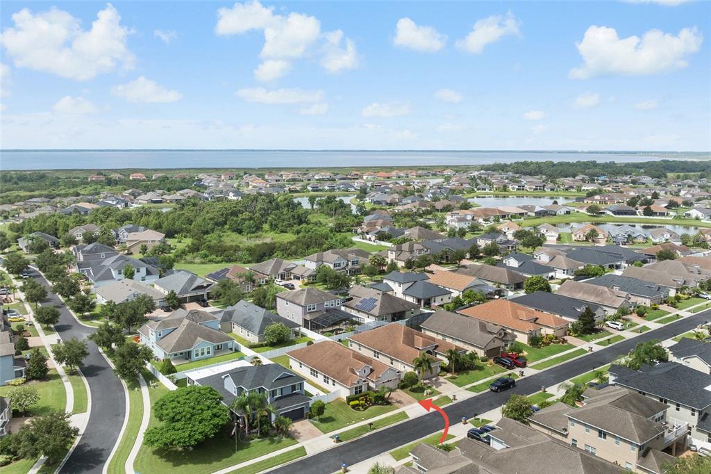 4436 Azure Isle Way Kissimmee, FL 34744 - Photo 33 of 35 an aerial view of residential building with outdoor space