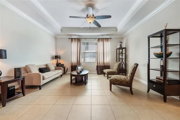 a living room with furniture and a window