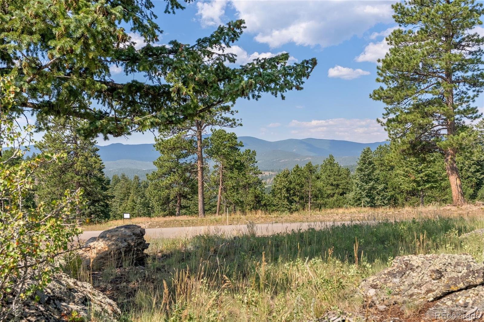6371 Canyon Creek Road Evergreen, CO 80439 - Photo 48 of 50 a view of lake background with house