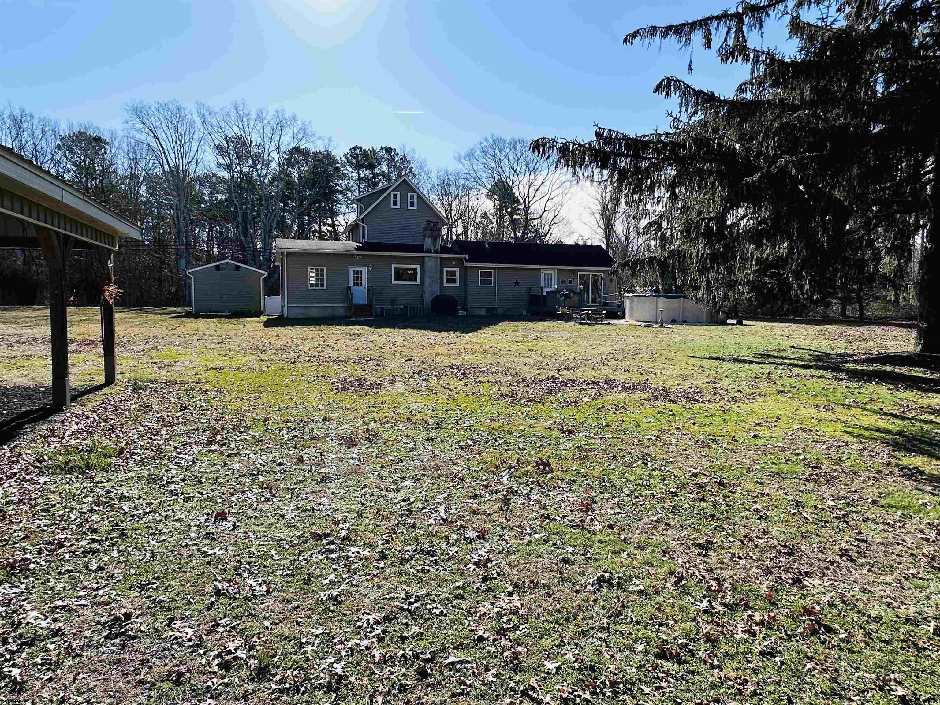 85 Leeds Point Road Absecon, NJ 08205 - Photo 4 of 5 a big yard with lots of green space