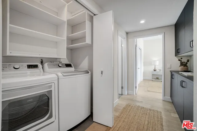 a view of a studio with wooden floor
