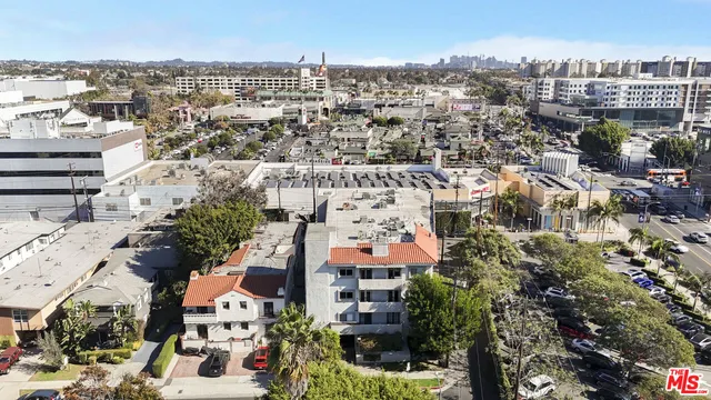 an aerial view of a city with lots of residential buildings