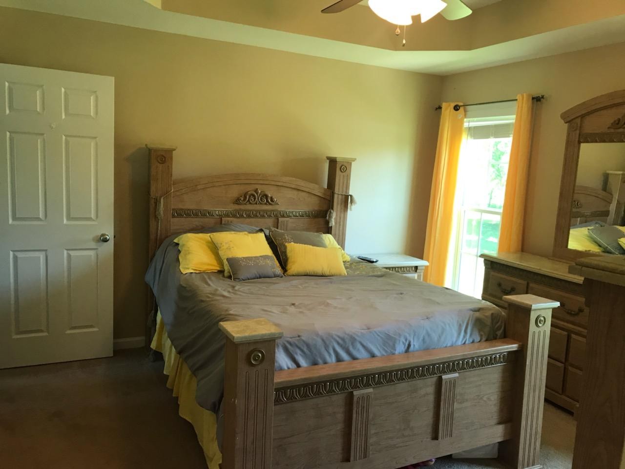 3 Ben Thompson Road Kelso, TN 37348 - Photo 8 of 24 a bedroom with a bed and flat tv screen on the dresser