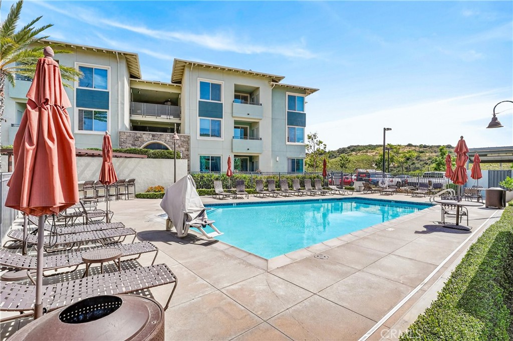 3 Listo Street Rancho Mission Viejo, CA 92694 - Photo 32 of 46 Esencia Amenity – Resort-Style Pool & Lounge Area