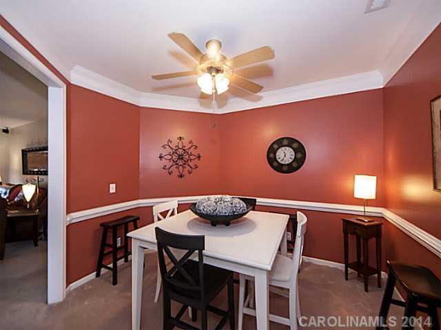 4920 Missi Lane Fort Mill, SC 29708 - Photo 2 of 16 a view of a dining room with furniture and chandelier