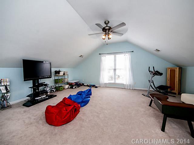 4920 Missi Lane Fort Mill, SC 29708 - Photo 14 of 16 a living room with furniture and a flat screen tv