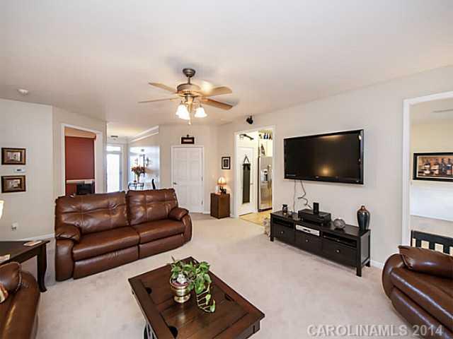 4920 Missi Lane Fort Mill, SC 29708 - Photo 4 of 16 a living room with furniture and a flat screen tv