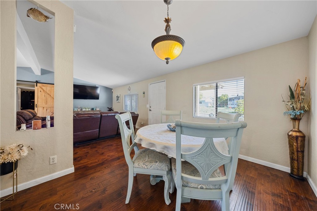 34437 Tree Lane Wildomar, CA 92595 - Photo 14 of 42 a view of a dining room with furniture and wooden floor