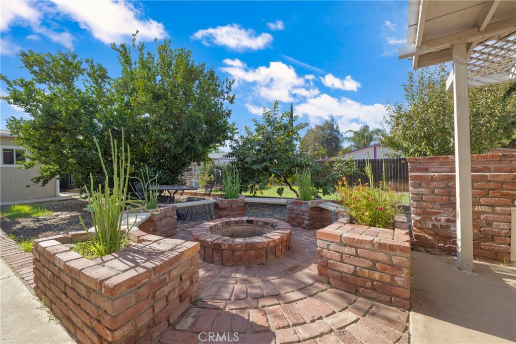34437 Tree Lane Wildomar, CA 92595 - Photo 6 of 42 a view of a backyard with sitting area