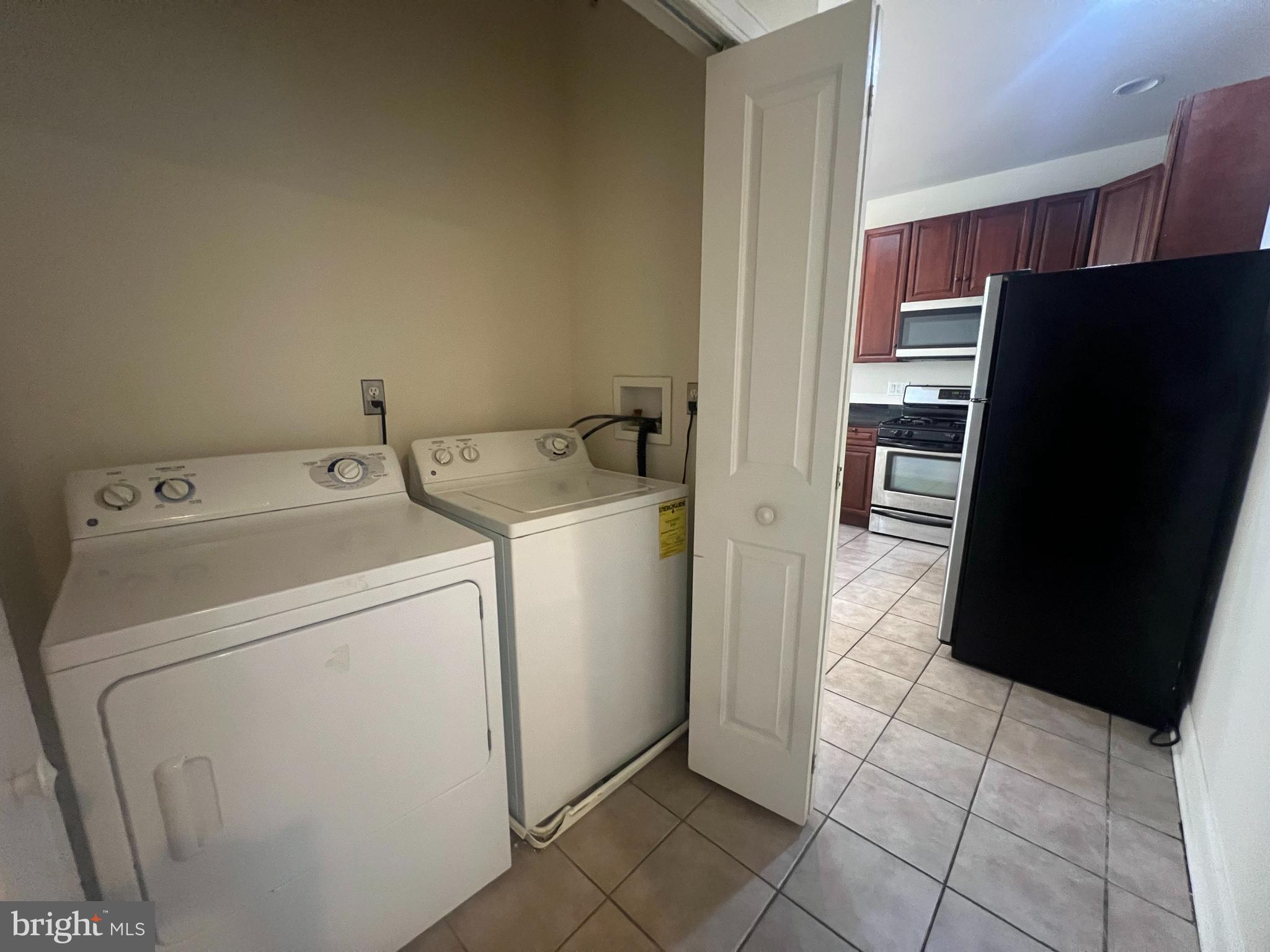 1930 North 17th Street, Unit B Philadelphia, PA 19121 - Photo 7 of 7 a utility room with dryer and washer