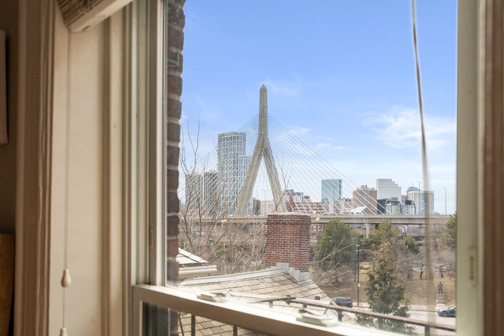 18 Harvard Street, Unit 3 Boston, MA 02129 - Photo 11 of 15 a view of a lake from a balcony
