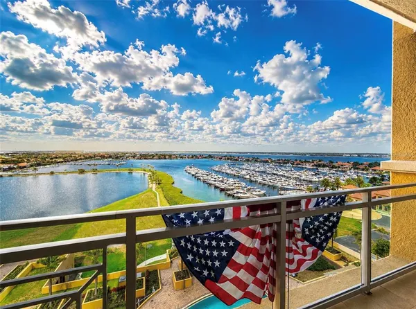 a view of a balcony with an ocean view