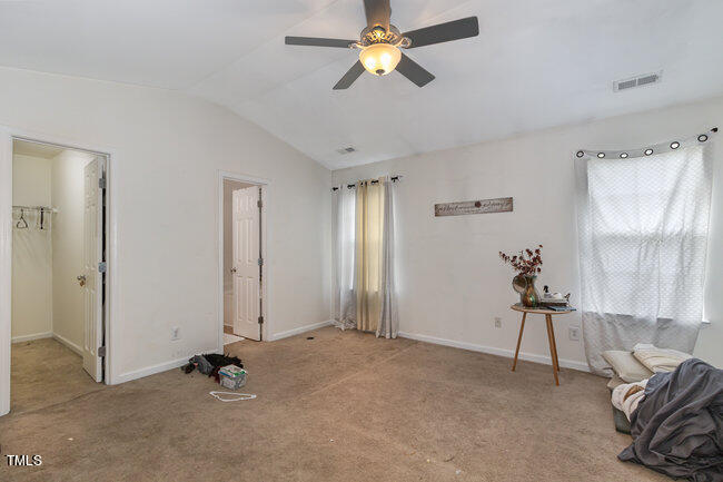 508 Summer Breeze Drive Durham, NC 27704 - Photo 16 of 28 a view of room with a ceiling fan