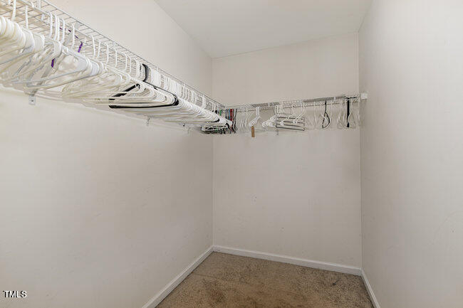 508 Summer Breeze Drive Durham, NC 27704 - Photo 19 of 28 a view of a room with racks on the wall