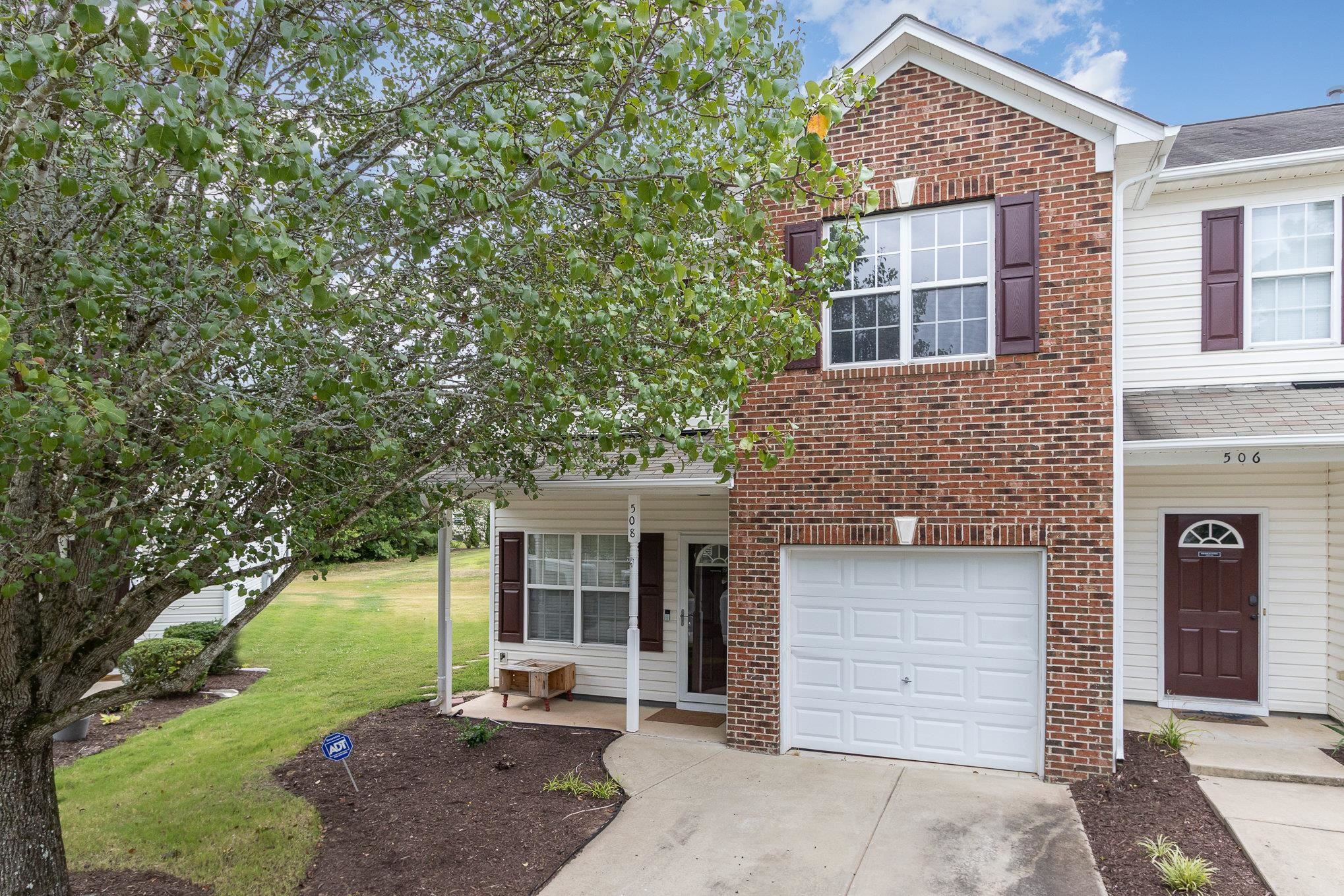 508 Summer Breeze Drive Durham, NC 27704 - Photo 2 of 28 front view of a house with a yard