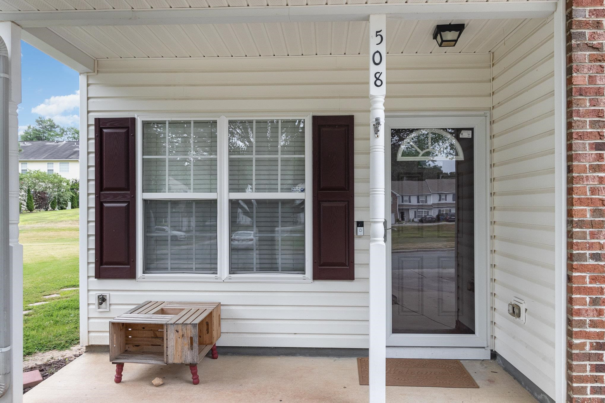 508 Summer Breeze Drive Durham, NC 27704 - Photo 3 of 28 a front view of a house with a large window