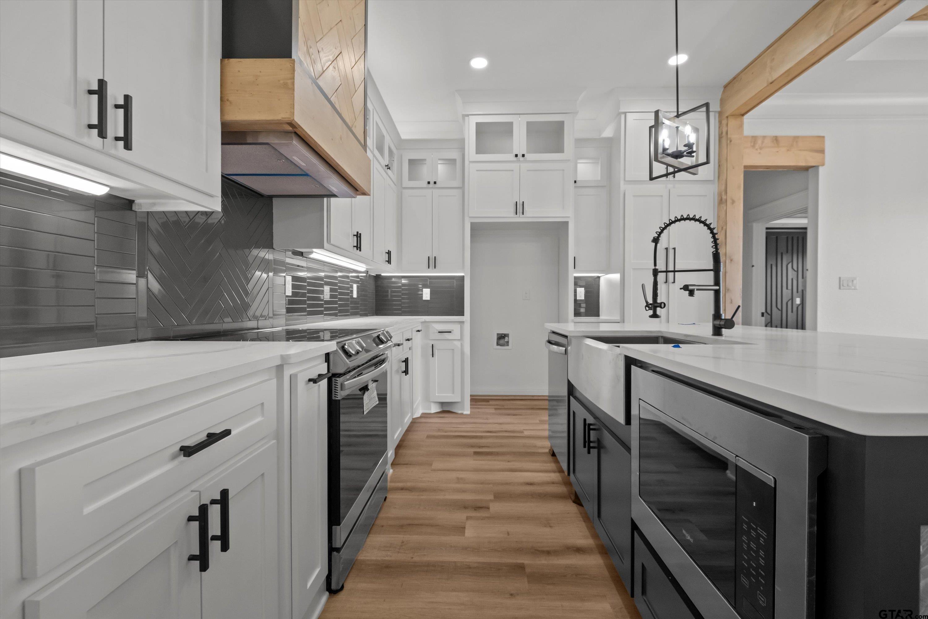 17762 Jayleen Lane Tyler, TX 75707 - Photo 14 of 24 a kitchen with stainless steel appliances granite countertop a sink and cabinets