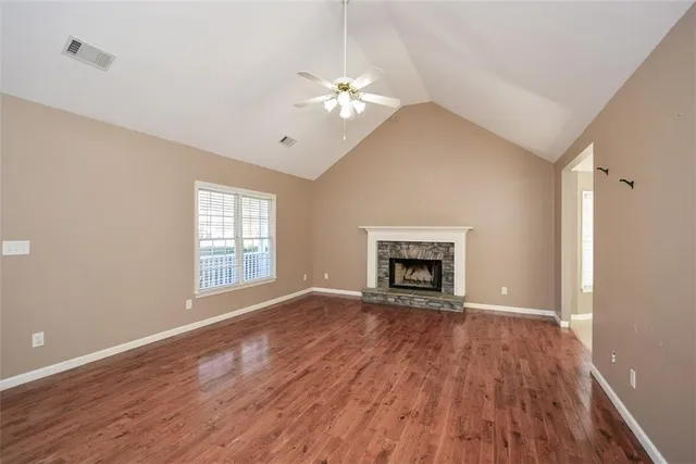 a kitchen with stainless steel appliances granite countertop a sink and cabinets