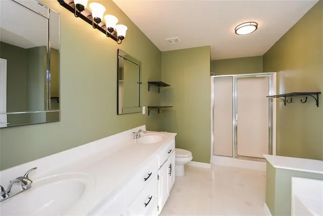 a view of a room with wooden walls