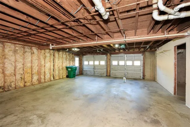 a view of yard with large trees