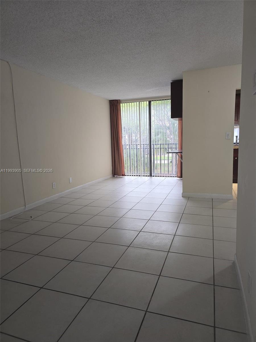17021 North Bay Road, Unit 225 Sunny Isles Beach, FL 33160 - Photo 2 of 24 a view of an empty room with a window