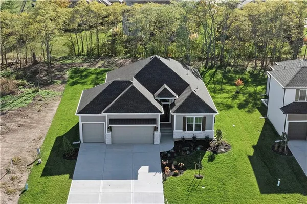 $700,000 | 2624 Northeast Woodland Oak Drive, Lee's Summit, MO 64086