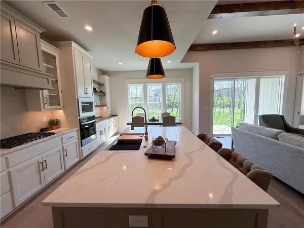 $700,000 | 2624 Northeast Woodland Oak Drive, Lee's Summit, MO 64086