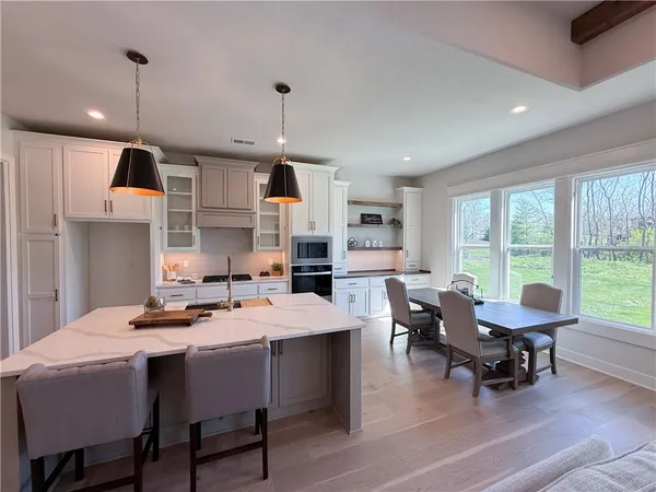 $700,000 | 2624 Northeast Woodland Oak Drive, Lee's Summit, MO 64086