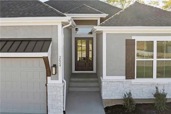 $700,000 | 2624 Northeast Woodland Oak Drive, Lee's Summit, MO 64086