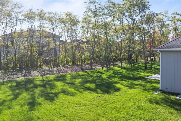 $700,000 | 2624 Northeast Woodland Oak Drive, Lee's Summit, MO 64086