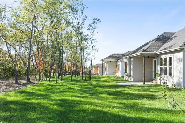 $700,000 | 2624 Northeast Woodland Oak Drive, Lee's Summit, MO 64086