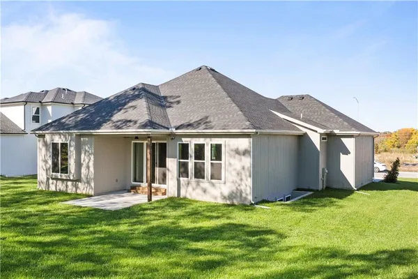 $700,000 | 2624 Northeast Woodland Oak Drive, Lee's Summit, MO 64086