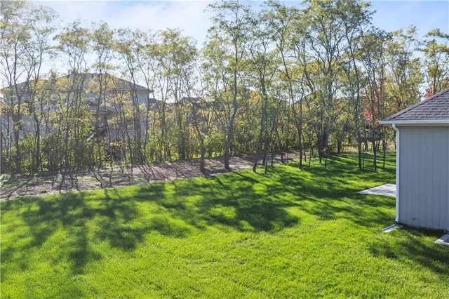 $750,000 | 2624 Northeast Woodland Oak Drive, Lee's Summit, MO 64086