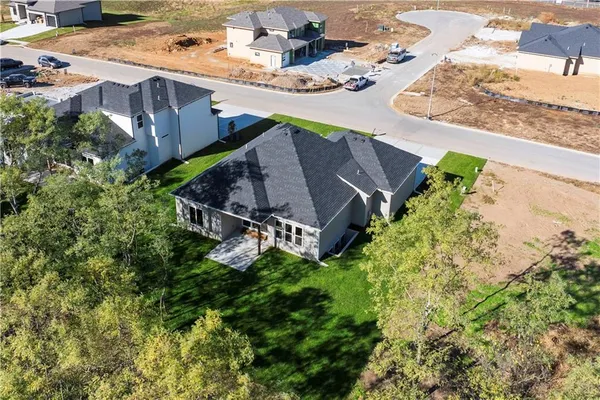 $700,000 | 2624 Northeast Woodland Oak Drive, Lee's Summit, MO 64086