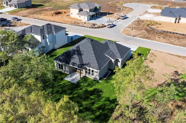 $750,000 | 2624 Northeast Woodland Oak Drive, Lee's Summit, MO 64086