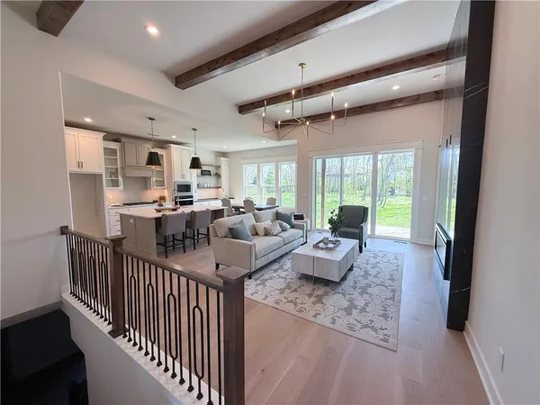 $700,000 | 2624 Northeast Woodland Oak Drive, Lee's Summit, MO 64086