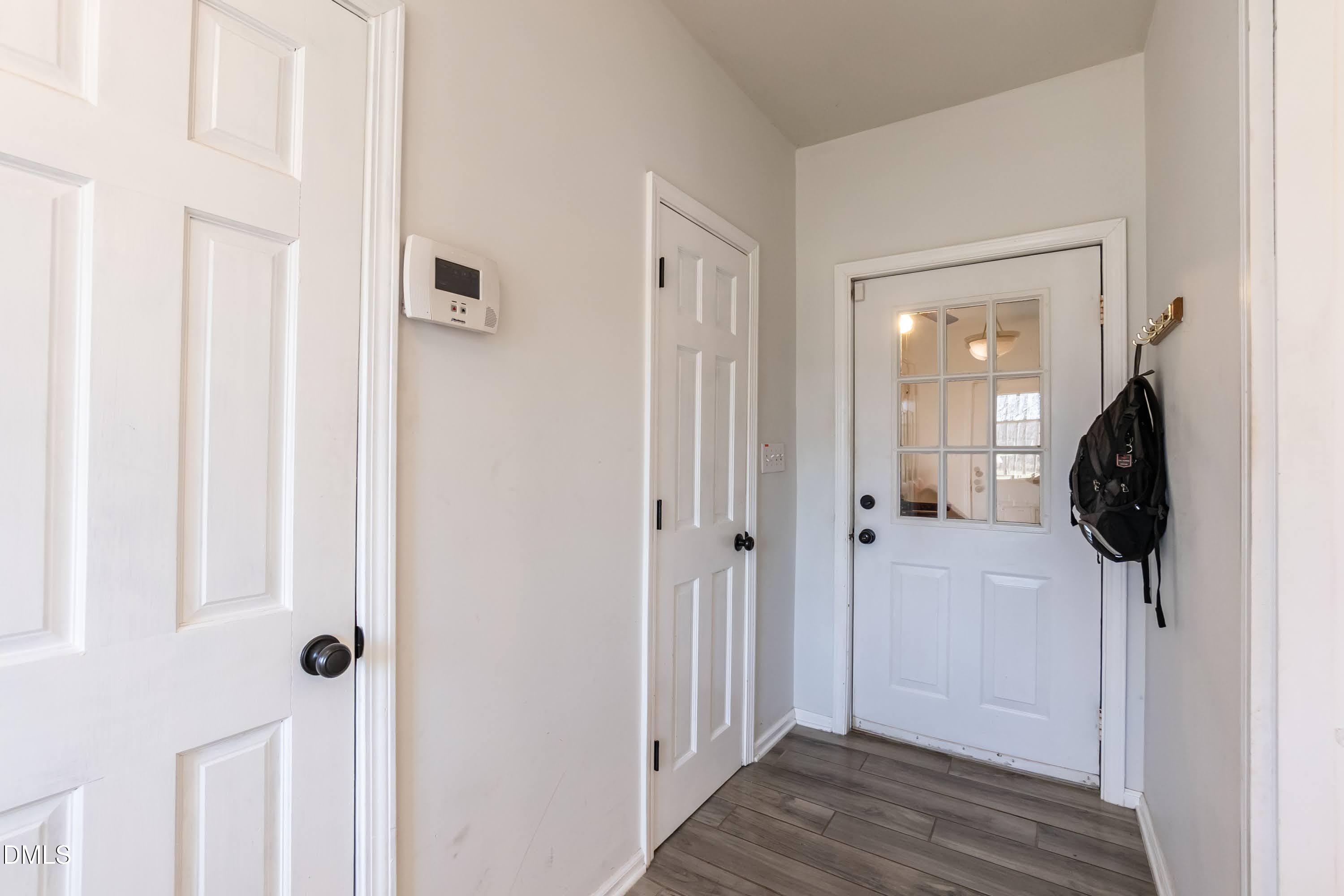 1722 Saddle Club Road Mebane, NC 27302 - Photo 17 of 37 a view of a bathroom from a hallway