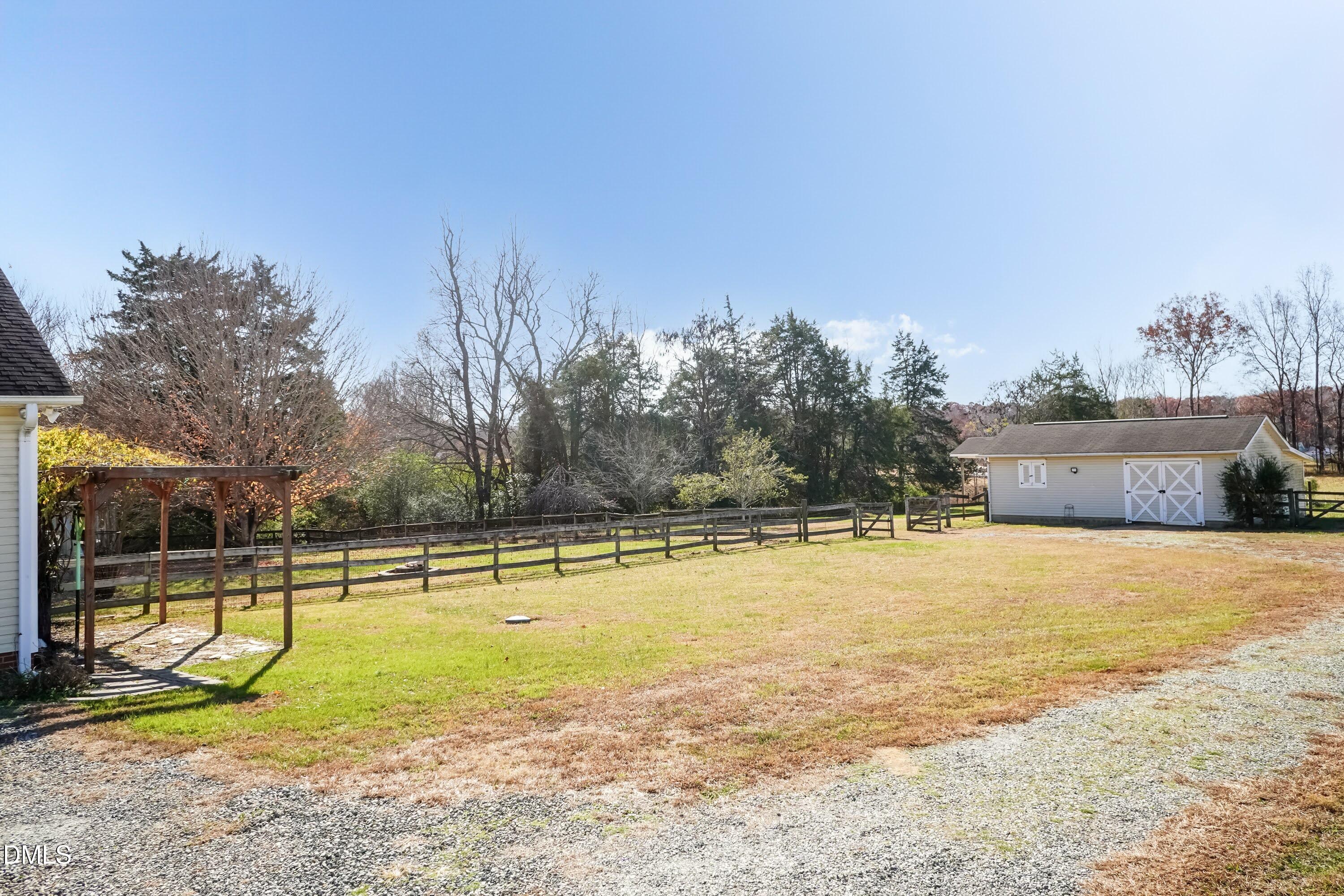 1722 Saddle Club Road Mebane, NC 27302 - Photo 27 of 37 a view of a swimming pool with an outdoor space and seating area